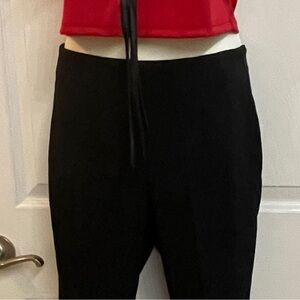 Classic Black form fitting pants *NICE *

MACHINE WASH
great pants excellent